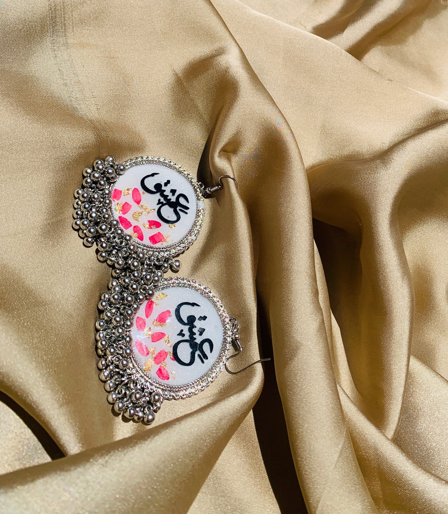 White resin jhumkay