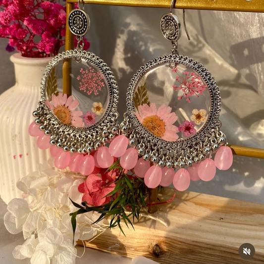 Transparent resin jhumkay with pink flowers