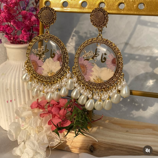 Transparent golden resin jhumkay