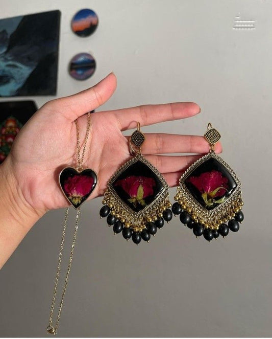 Black resin jhumkay with heart pendent