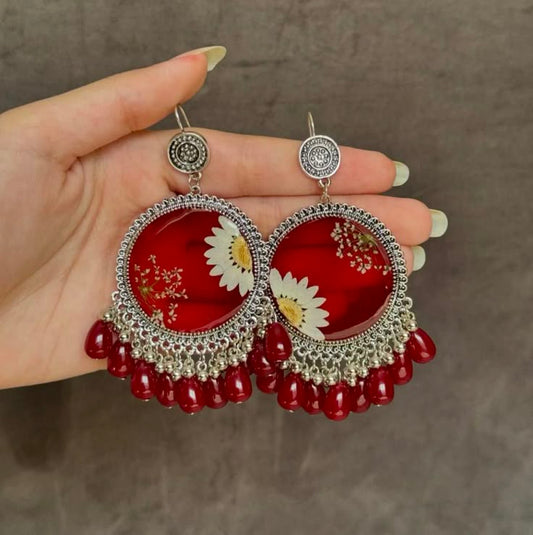 Red resin jhumkay